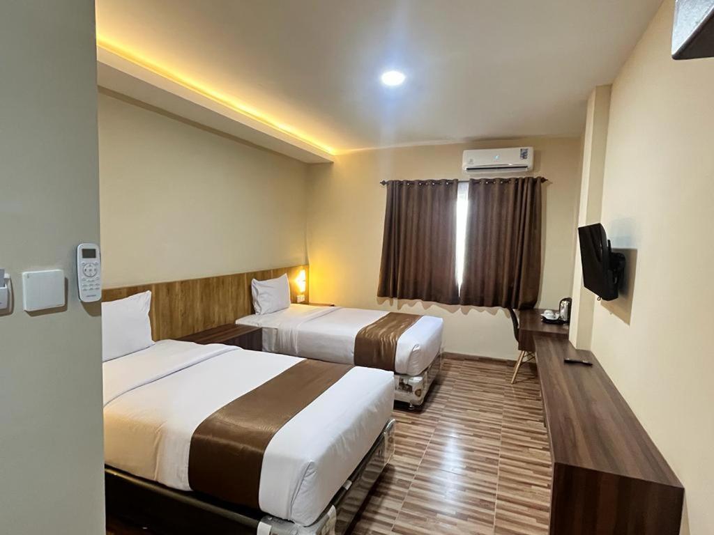 T Hotel Kualanamu Lubukpakam ภายนอก รูปภาพ
